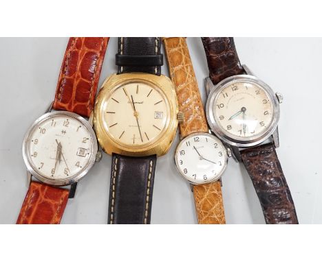 Three assorted gentleman's steel or gilt wrist watches, including retailed by Buhre and a lady's steel manual wind Bulova wat