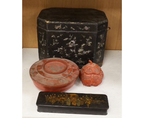 A Chinese black lacquer and mother of pearl box, two red lacquer boxes and a Chinoiserie painted box, largest 28cm wide, 37cm