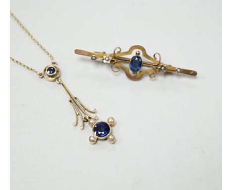 An Edwardian 15ct gold, sapphire and seed pearl set drop pendant necklace, overall 52cm, gross weight 4.5 grams and one other