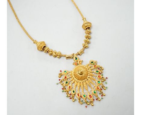 An Indian yellow metal two colour enamel and seed pearl set drop pendant necklace, overall, 45cm, gross weight 40.5 grams.