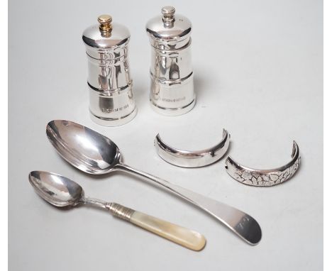 A modern pair silver mounted salt and pepper grinders, 10.6cm, a Georgian silver table spoon, A Victorian mother of pearl han