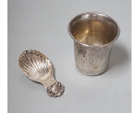 A Continental white metal tumbler cup, 66mm and a Mappin &amp; Webb plated caddy spoon