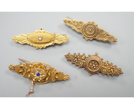 Three early 20th century 15ct brooches including one with seed pearl, 41mm, gross weight 8.1 grams and one 9ct gold brooch, 3