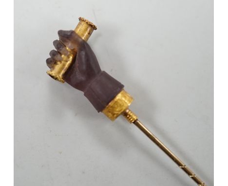 A cased 19th century yellow metal and amethyst glass? set Stanhope stick pin, modelled as hand holding a spyglass, 85mm, the 