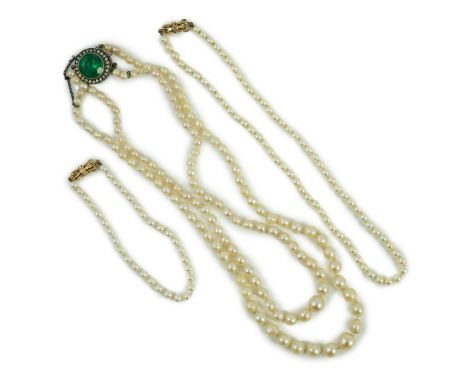 A twin strand graduated cultured pearl necklace, with white metal and two colour paste set clasp, 40cm, a single strand cultu