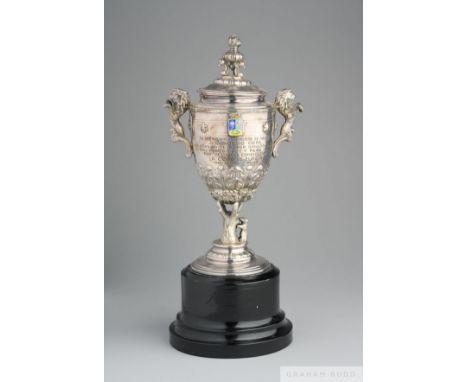 Raymond Kopa white-metal and enamel trophy  with lion handles and finial, inscribed in Spanish and translated The City Counci