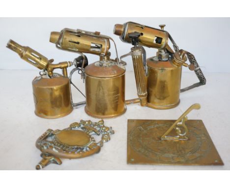 3x brass blow lamps, door knocker and sundial 