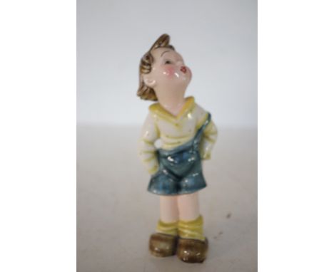 Austrian ceramic figure of a boy Height 19 cm 