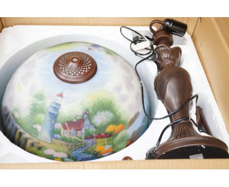 Bronzed table lamp with ornate glass shade. As new still in original box