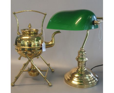 Brass spirit kettle on burner stand in the style of Christopher Dresser, together with a modern brass bankers desk lamp with 