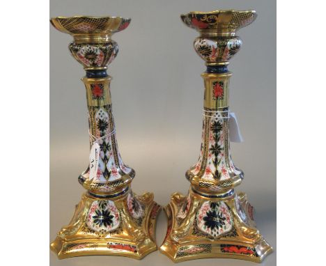 A pair of Royal Crown Derby English bone china Imari candlesticks, 27cm high approx. (2)(B.P. 21% + VAT) One of the candlesti