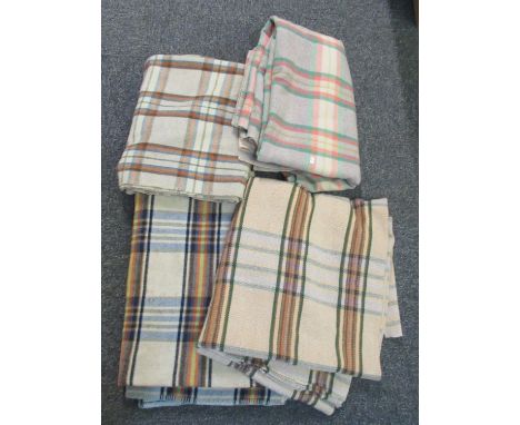 Four vintage check design blankets or carthen in various colours. (4) (B.P. 21% + VAT)grey/black/orange/blue - multiple holes