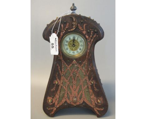 Unusual Arts & Crafts design wooden mantel clock with applied brass stylised foliate decoration incorporating tortoise, moon 