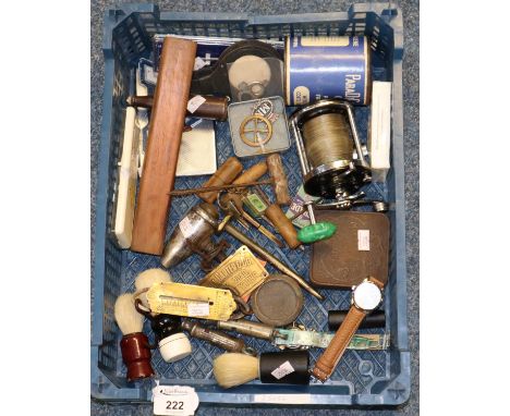 Box of oddments to include; shaving brushes, vintage Salter pocket scales, policemans whistles, wristwatches, fishing reel et