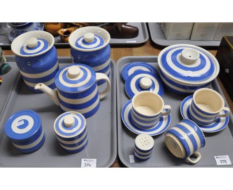 Two trays of T.G. Green blue and white striped pottery to include: two cups and saucers, a further cup, teapot, lidded jars, 