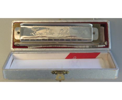 The Larry Adler professional 12 Hohner chromatic harmonica, in original box. (B.P. 21% + VAT) 