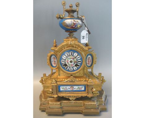 19th Century French gilt spelter architectural mantel clock with French porcelain panels, porcelain Roman face, two train bra