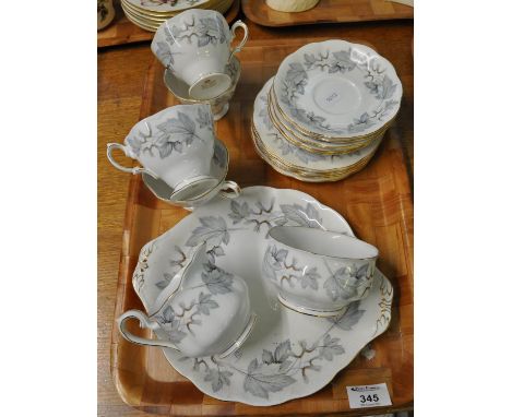 Royal Albert 'Silver Maple' part teaware comprising: four cups, six saucers, six side plates, one larger plate, and a jug and