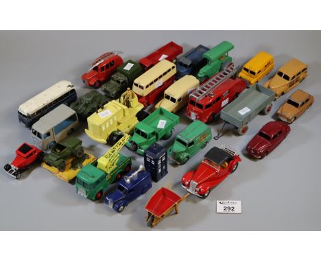 A collection of play worn vintage Dinky toys to include fire engine 555, Bedford truck, heavy tractor, Bedford 480, Daimler, 