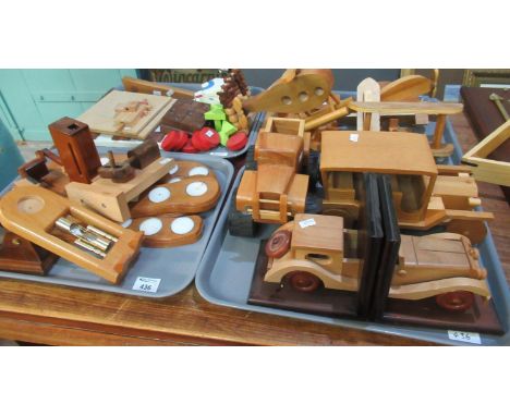 Four trays of scratch built toys and other items to include; vintage cars, pair of bookends, aeroplanes, candle holders, egg 