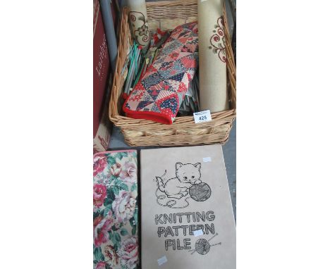 Large collection of knitting needles, some in cases including; two fabric crewel embroidered cylindrical cases, together with