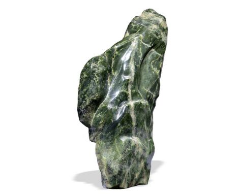 Minerals: A large green nephrite freeform  82cm wide 68kg  Tools and amulets made of Nephrite date back to Early Neolithic ti