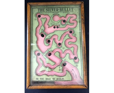 A WWI silver bullet dexterity puzzler, circa 1916, maker R. Farmer and Son, framed as a stylized map - the Allied advance on 