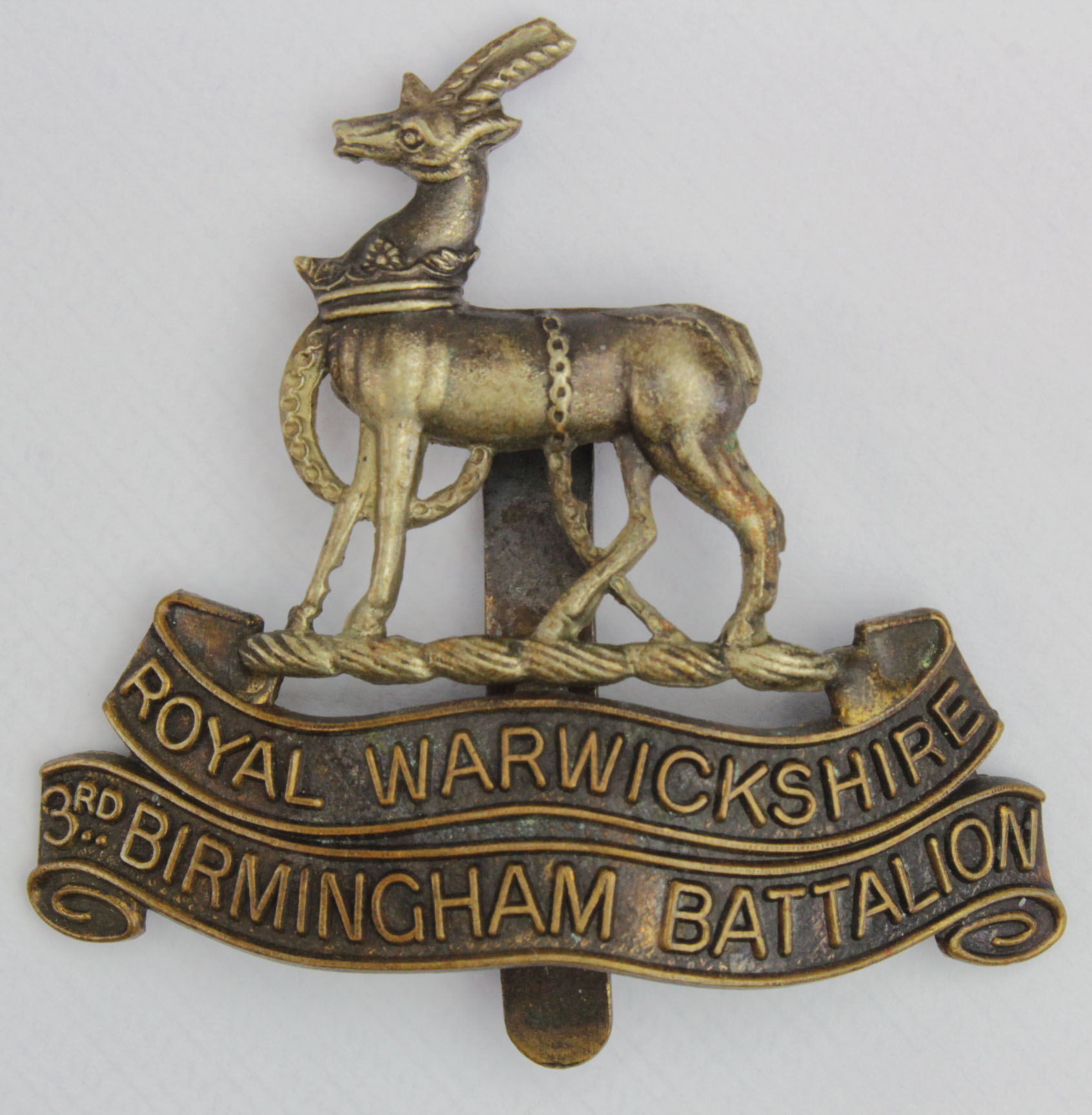 Badge a Birmingham Pals 3rd Bn Royal Warwickshire Regt cap badge.