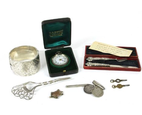 A wide sterling silver hinged bangle, with engraved decoration to the top half, Birmingham, 68.21g, together with a silver ke