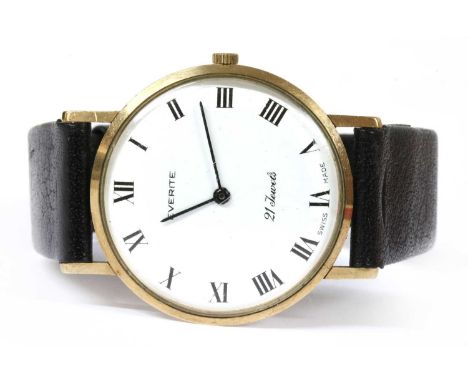 A 9ct gold Everite slimline mechanical strap watch, 34mm diameter, with a white enamel dial, black Roman numerals, and pencil
