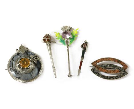 A quantity of Scottish silver brooches, to include a provincial Aberdeen granite brooch, mounted in silver with 'C' catch and