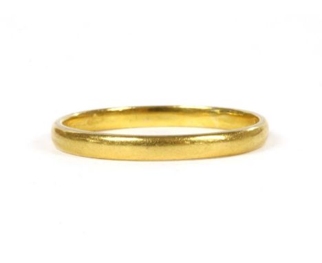 A 22ct gold light court section wedding ring, London 1953, 1.87g.Finger size N¾Condition report: Surface marks/scratches.