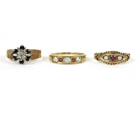 A 9ct gold diamond and sapphire cluster ring, with tapered engraved shoulders, London, together with a 9ct gold paste and rub