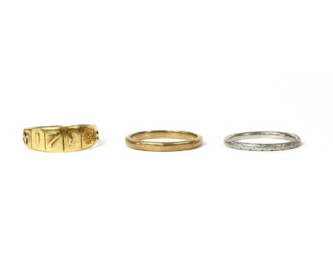 A Victorian 18ct gold Mizpah ring, with tapered head and plain shank, Chester 1884, 2.12g, together with a 9ct gold wedding r