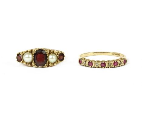 A 9ct gold garnet and pearl ring, with alternating oval mixed cut garnets and cultured pearls, grain set to the carved style 