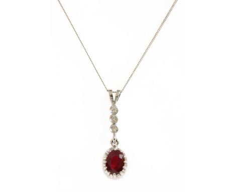 An 18ct white gold ruby and diamond pendant, an oval mixed cut ruby, claw set, to a row of brilliant cut diamonds spitch set 