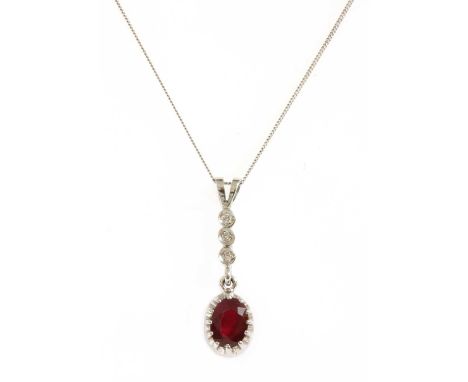 An 18ct white gold ruby and diamond pendant, an oval mixed cut ruby, claw set, to a row of brilliant cut diamonds spitch set 