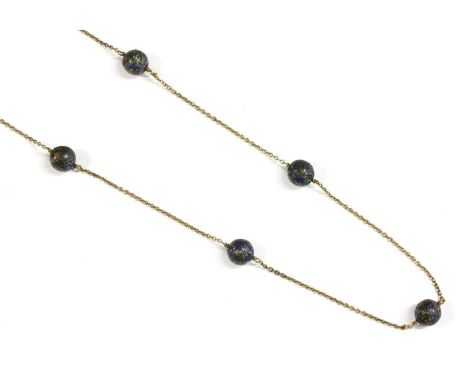 A gold enamel bead necklace, five metal beads with blue, green, purple and yellow cloisonné enamel, wire set and joined by le