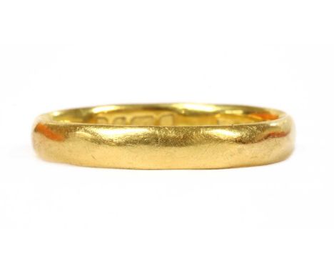 A 22ct gold wedding ring, of light court section, London 1956, 2.49g.Finger size MCondition report: Surface marks/scratches.