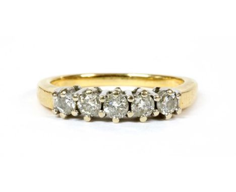 An 18ct gold five stone diamond ring, a row of brilliant cut diamonds, with a total estimated weight of approximately 0.45ct,