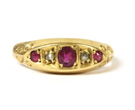 An 18ct gold five stone ruby and diamond ring, with a graduated row of alternating oval and circular mixed cut rubies, and ro