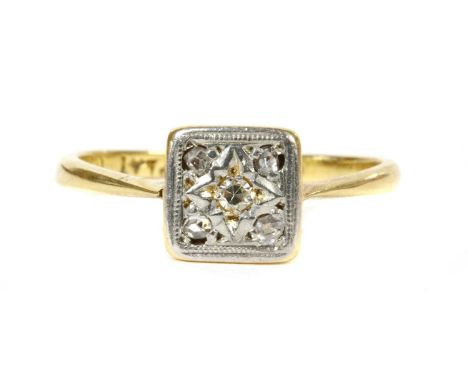 A gold diamond cluster ring, an eight cut diamond and four rose cut diamonds, grain set to the square head, faced in white an