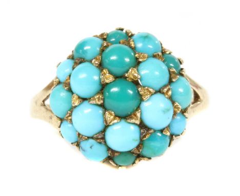 A 9ct gold turquoise bombé cluster, later converted to a ring, with round turquoise cabochons, grain set to the bombé head, t