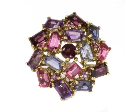 A 9ct gold assorted gemstone cluster ring, with round mixed cut and step cut garnets, amethysts, pink tourmalines, etc, all c