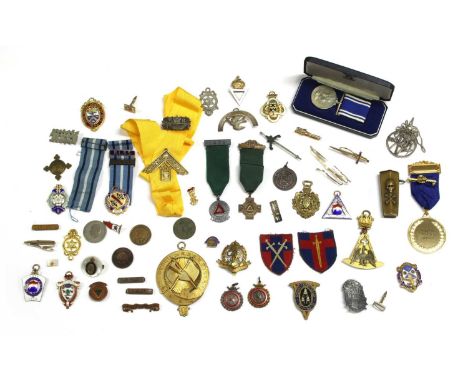 A collection of Masonic jewels and medals, to include a silver engraved Royal Arch Companion’s breast jewel, a silver Royal A