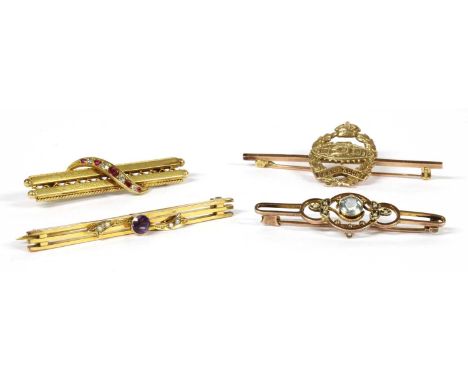 A gold ruby and diamond bar brooch, a graduated row of alternating Swiss and old eight cut diamonds, and mixed cut rubies, gr