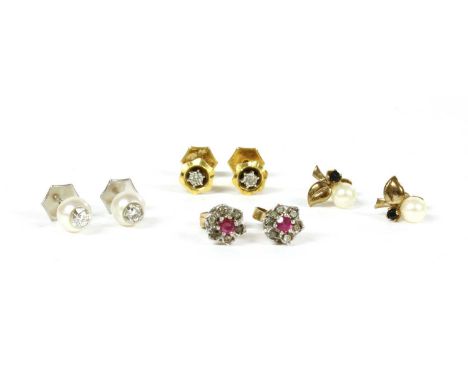 Four pairs of gold earrings, to include a pair of 9ct gold ruby and diamond cluster earrings, a pair of 9ct gold diamond set 