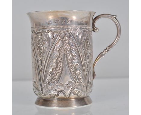 A 19th Century Victorian English hallmarked christening cup having a cylindrical body with flared rim and scrolled handle, th