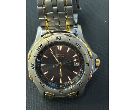 Accurist solar titanium with cross hair dial, date & compass bezel watch  