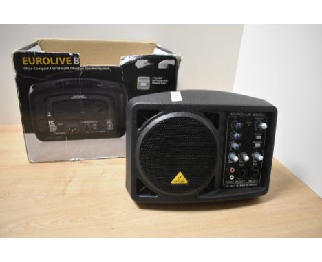 A Behringer Eurolive 150 Watt compact monitor system, with box, powers up and sound through each channel but not fully tested